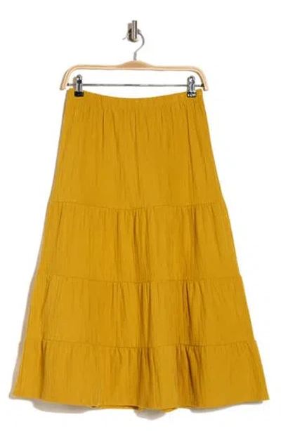 Chelsea And Theodore Tiered Midi Skirt In Mustard