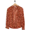 Chenault Long Sleeve Ruffle Neck Print Bodre Top In Brown