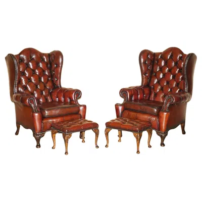 Pre-owned Chesterfield Pair Of  Vintage Oxblood Leather Wingback Armchairs & Footstools In Red