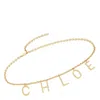 Chloé Metallic Belt With Adjustable Hook Closure And Logo Lettering Charm In Brass Woman In Gold
