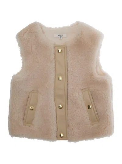 CHLOÉ BEIGE SLEEVELESS CREWNECK COAT WITH FRONT BUTTON CLOSURE IN ECOFUR GIRL