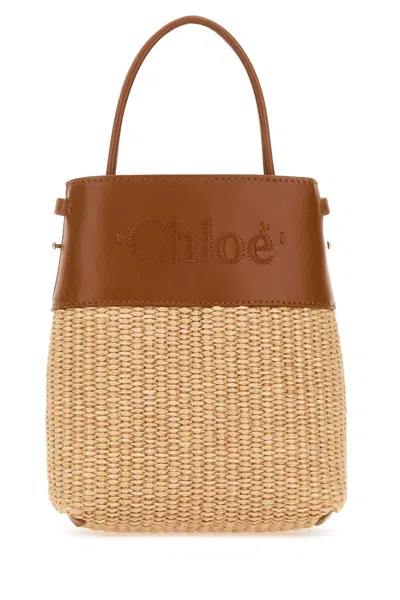 Chloé Bicolor Raffia And Leather Micro Handbag In Caramel