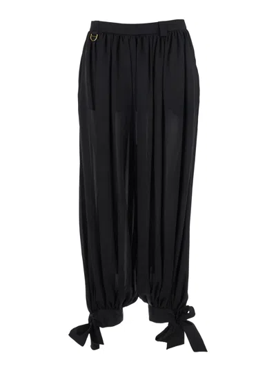 CHLOÉ CHLOÉ WOMEN BLACK PANTS WITH RUCED DETAILS AND TIED CUFFS IN SILK WOMAN