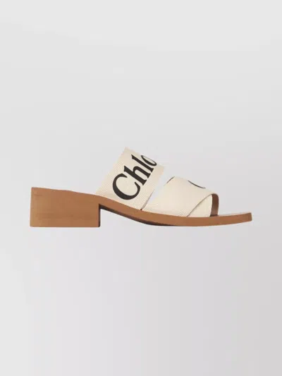 CHLOÉ BLOCK HEELED MULES LOGO