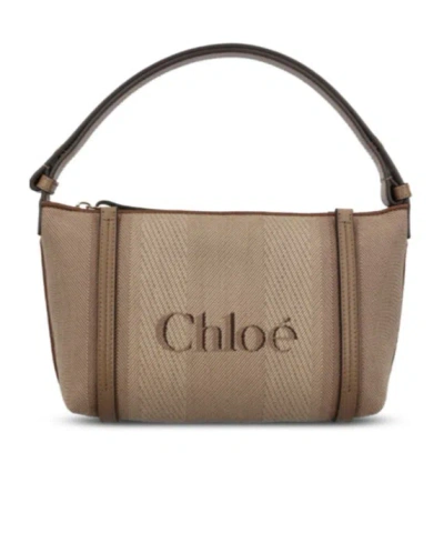Chloé Carry Logo Detailed Shoulder Bag In Brown