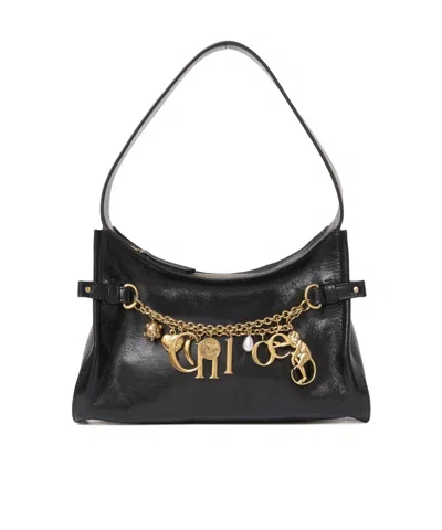 Chloé Charms Shiny Leather Hobo Bag In Black