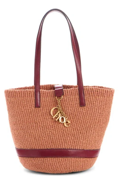 Chloé Charms Woven Straw Tote In Orange