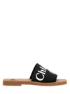 Chloé Woody Flat Logo Ribbon Slide Sandals In Black