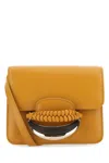 Chloé Versatile Leather Clutch With Unique Front Handle In 216