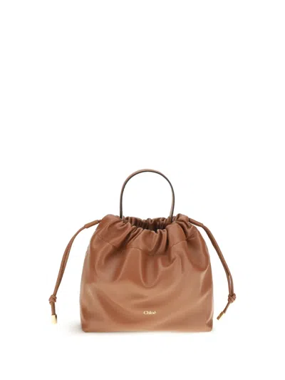 Chloé Drawstring Leather Bucket Bag In Brown
