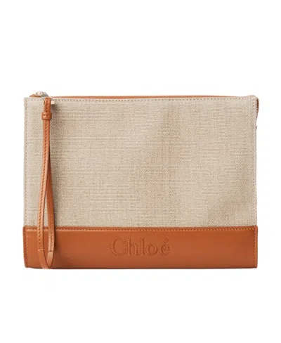 Chloé Embossed-logo Clutch Bag In Nude