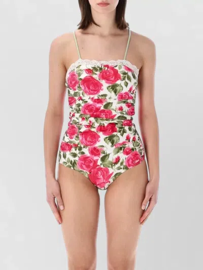 Chloé Bow-detailed Ruched Lace-trimmed Floral-print Swimsuit In Pink