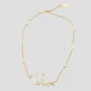 Chloé Vintage Gold Necklace With Cursive Name Pendant And Delicate Chain In Gold