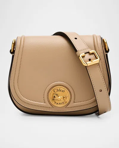 Chloé Horse Medal Saddle Crossbody Bag In Grained Leather In Brown
