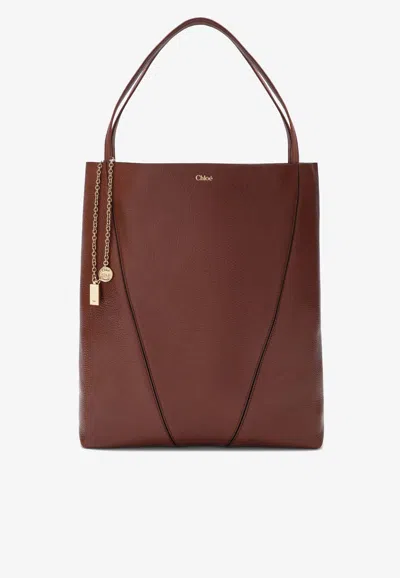 Chloé Large Spin Grained Leather Tote Bag In Brown
