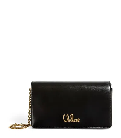 Chloé Leather Iconic Flap Chain Wallet In Black