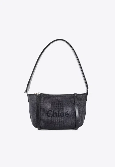 Chloé Logo Embroidered Woven-raffia Shoulder Bag In Black