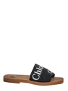 Chloé Woody Flat Logo Ribbon Slide Sandals In Black