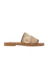 Chloé Logo Woody Flat Mules In Nude