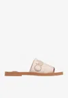 Chloé Logo Woody Flat Mules In Beige