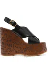 Chloé Women 'maxime' Black Wedges With High Embossed High Wedge Heel And Crossover Strap On The Toe In Black