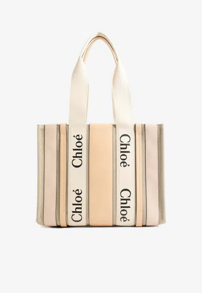 Chloé Medium Woody Raffia Tote Bag In Pink
