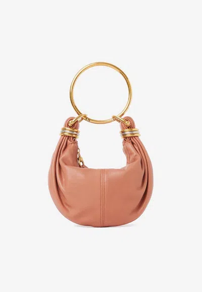 Chloé Mini Bracelet Grained Leather Hobo Bag In Orange