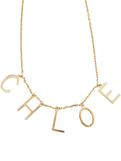 Chloé Letters Necklace In Vintage Gold Brass In Brown