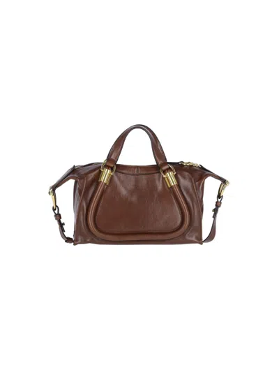 Chloé Shoulder Bag With Adjustable Strap And Dual Handles In Brown