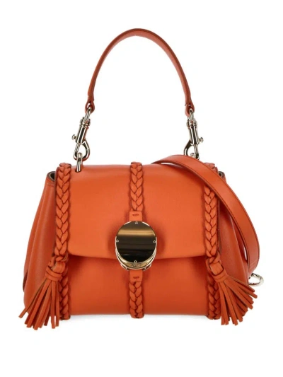 Chloé Penelope Mini Soft Shoulder Bag In Orange