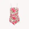 Chloé Bow-detailed Ruched Lace-trimmed Floral-print Swimsuit In Pink