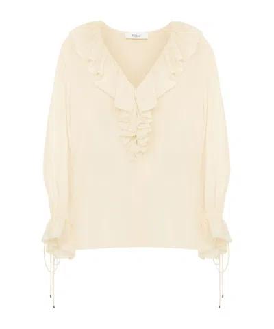 Chloé Ruffled V-neck High-low Top In Yellow