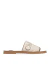Chloé Logo Woody Flat Mules In Nude & Neutrals