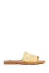 Chloé Woody Logo Embroidered Flat Slides In Brown