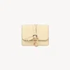 Chloé Small Alphabet Tri-fold In Grained Leather In Yellow