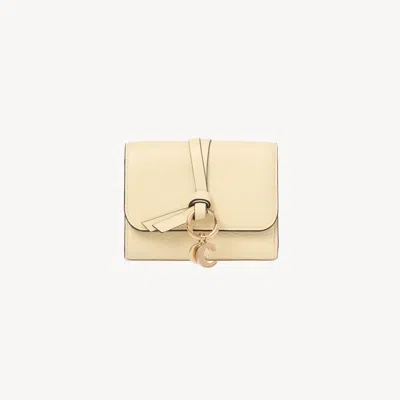 Chloé Small Alphabet Tri-fold In Grained Leather In Yellow