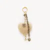 Chloé Symbols Heart Bag Charm In Gold