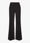 Chloé Flared Wool Trousers Asymmetrical Hems In Black
