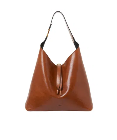 Chloé Triomphe-detailed Leather Tote Bag In Brown