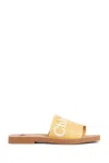Chloé Woody Logo Embroidered Flat Slides In Yellow