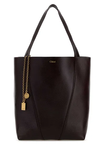 Chloé Chloe Women Aubergine Leather Spin Shopping Bag In Brown