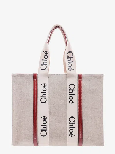 CHLOÉ CHLOE' WOMEN LINEN SHOULDER BAG WITH LOGO PRINT. THIS BAG IS MADE WITH LOWER ENVIRONMENTAL IMPACT MA