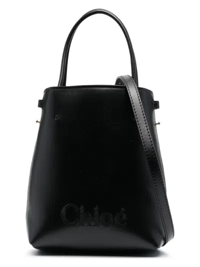Chloé Sense Leather Bucket Bag With Circular Handles In Black
