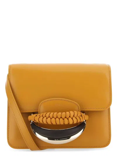 CHLOÉ WOMEN'S MUSTARD LEATHER KATTIE CLUTCH