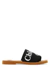 Chloé Woody Flat Logo Ribbon Slide Sandals In Black