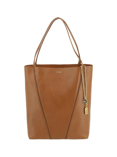 Chloé Spin Embellished Textured-leather Tote In Brown