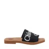 Chloé Woody Flat Logo Ribbon Slide Sandals In Black