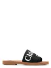 Chloé Woody Flat Logo Ribbon Slide Sandals In Black