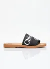 Chloé Woody Flat Logo Ribbon Slide Sandals In Black
