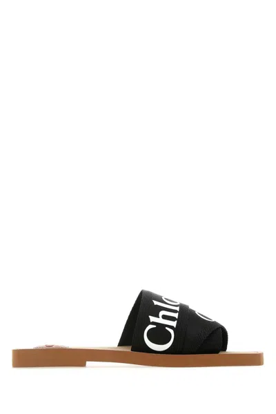 Chloé Woody Black Sabot With Contrasting Logo In Canvas
